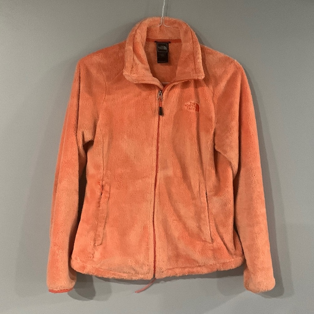 North Face Plush zip up. Women’s medium. Color, soft orange.